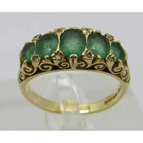 302 - Antique style 18ct graduated emerald and diamond ring, Sheffield 1994, size M/N, 5.2g