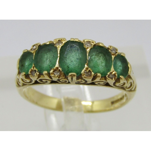 302 - Antique style 18ct graduated emerald and diamond ring, Sheffield 1994, size M/N, 5.2g