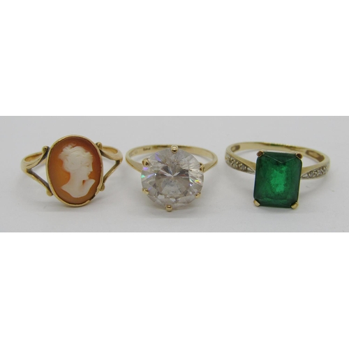 311 - Three 9ct dress rings to include a green paste and diamond example, size P/Q and a cameo example, 8.... 