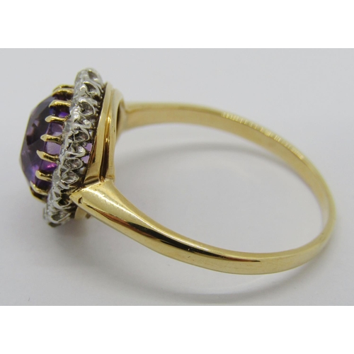 324 - Mid-20th century yellow metal amethyst and diamond halo cluster ring, ring head 1.3cm diameter appro... 