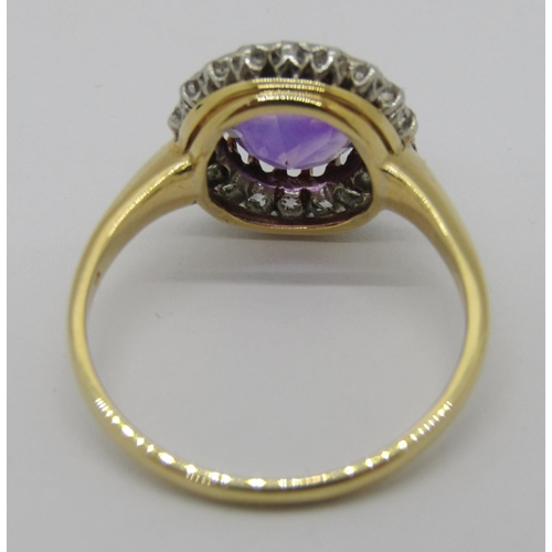 324 - Mid-20th century yellow metal amethyst and diamond halo cluster ring, ring head 1.3cm diameter appro... 