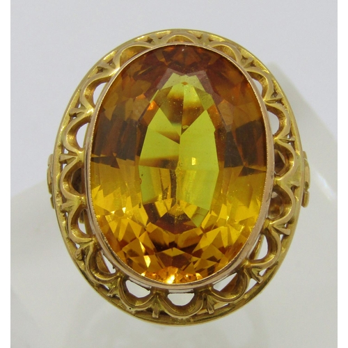 333 - Vintage synthetic yellow sapphire cocktail ring, the oval sapphire measuring 1.9 x 1.4cm approx, gol... 