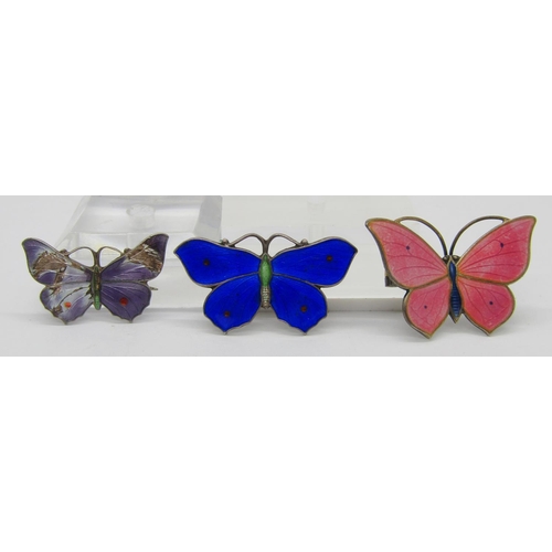 342 - Three enamelled silver butterfly brooches; a pink 830S example by Marius Hammer, a cobalt blue examp... 