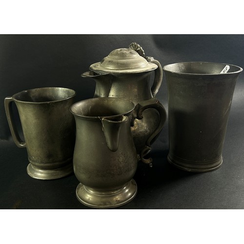 268A - Four large pewter vessels and seven pewter candlesticks