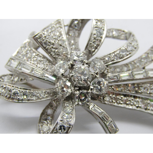 283 - Good quality circa 1950s vari-cut diamond ribbon spray brooch in white metal (probably platinum), la... 