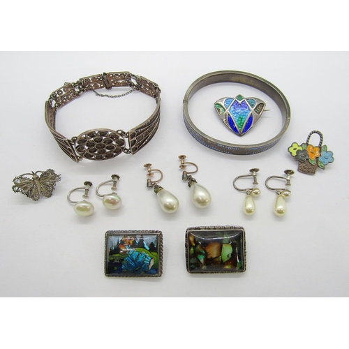 354 - Collection of antique and later silver jewellery to include an Arts & Crafts enamelled brooch in the... 