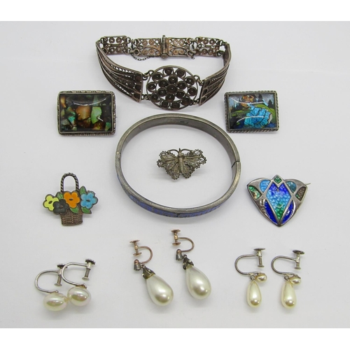 354 - Collection of antique and later silver jewellery to include an Arts & Crafts enamelled brooch in the... 