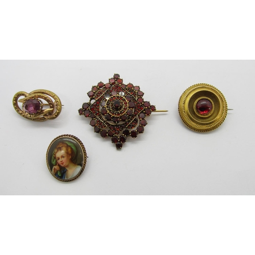 355 - Collection of antique jewellery to include a gilt metal Bohemian garnet brooch (af), various carved ... 