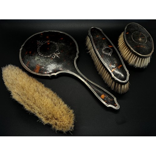 203A - A cased set of silver handled tea knives and a cased set of forks, and a tortoiseshell and silver dr... 