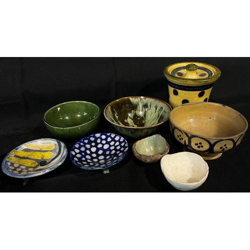 10 - A collection of studio pottery bowls to include a small Japanese dish by Mashiko, example by St Werb... 