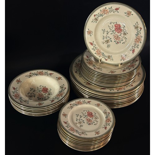 126 - Minton Jasmine pattern dinnerware comprising twelve dinner plates, eleven side plates of two sizes, ... 