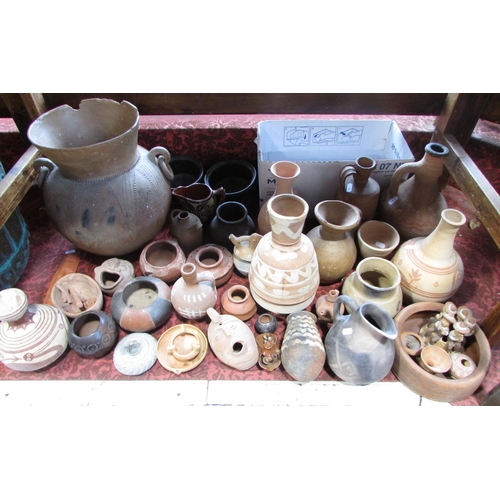 452 - Ethnic pottery of African/Indian/South American and other origin, together with a collection of foss... 