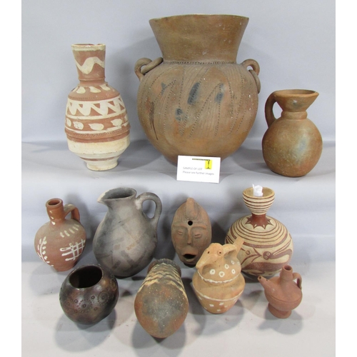 452 - Ethnic pottery of African/Indian/South American and other origin, together with a collection of foss... 