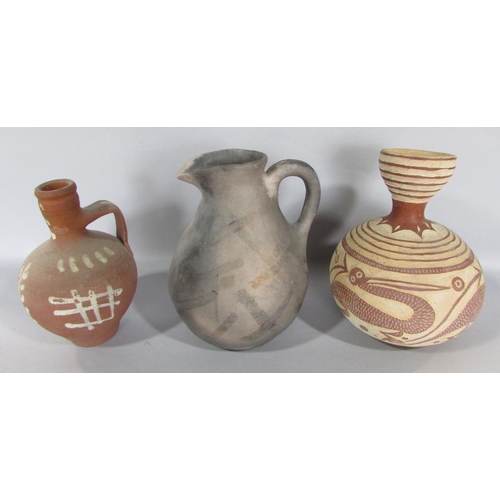 452 - Ethnic pottery of African/Indian/South American and other origin, together with a collection of foss... 