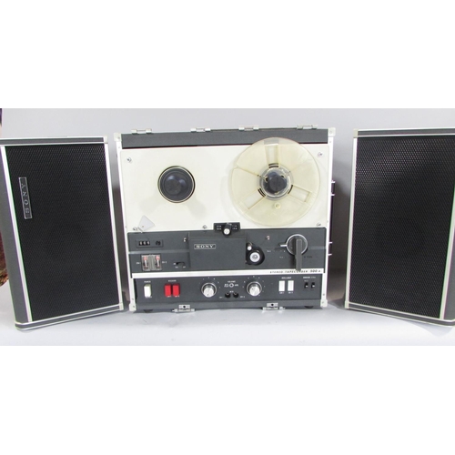 455 - A Sony 500 A stereo reel to reel tape recorder self-contained in a secure hard case, an Elmo 8mm pro... 