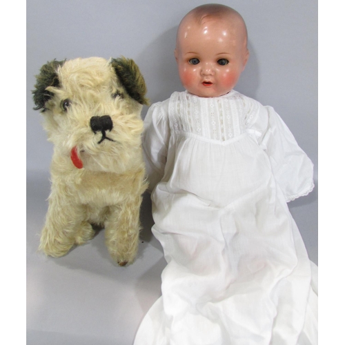 457 - A miscellaneous collection of items including an early 20th century bisque head doll, three vintage ... 