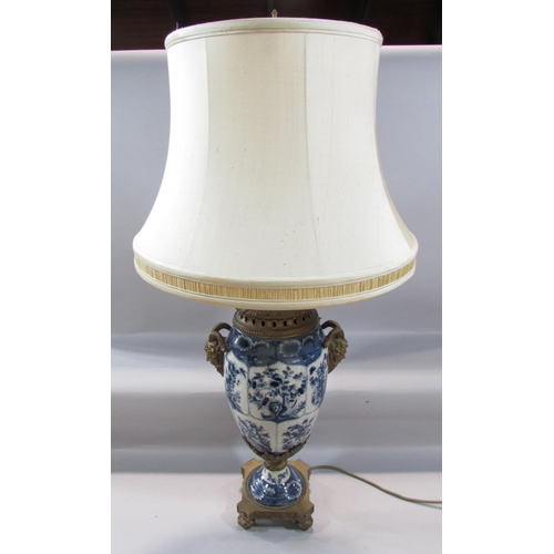 475 - A 19th century style blue and white crackle glazed lamp with gold satyre masks with a shade, 57cm hi... 