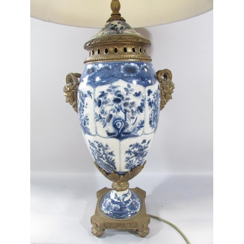 475 - A 19th century style blue and white crackle glazed lamp with gold satyre masks with a shade, 57cm hi... 