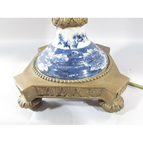 475 - A 19th century style blue and white crackle glazed lamp with gold satyre masks with a shade, 57cm hi... 