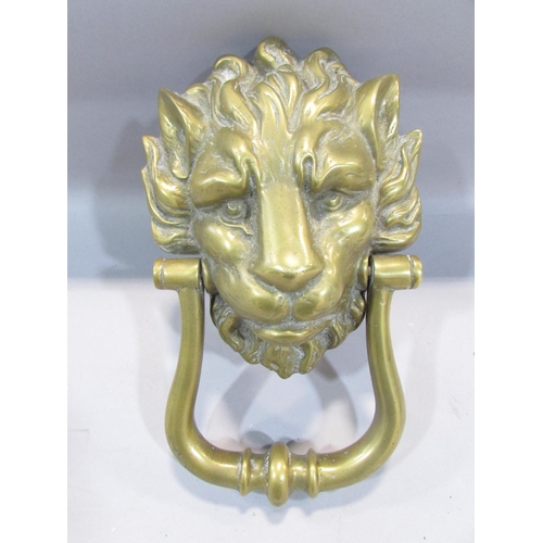 478 - A brass lion mask door knocker, with screw fastenings, 24cm.