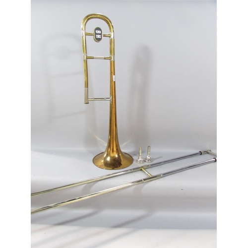 490 - A Vintage Boosey & Hawkes brass trombone, with two mouth pieces in it’s original case.