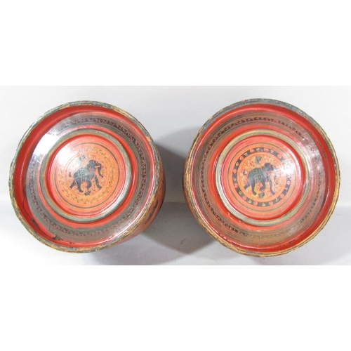 500 - A collection of five Burmese red lacquered ware, two circular boxes, a single rectangular box and tw... 