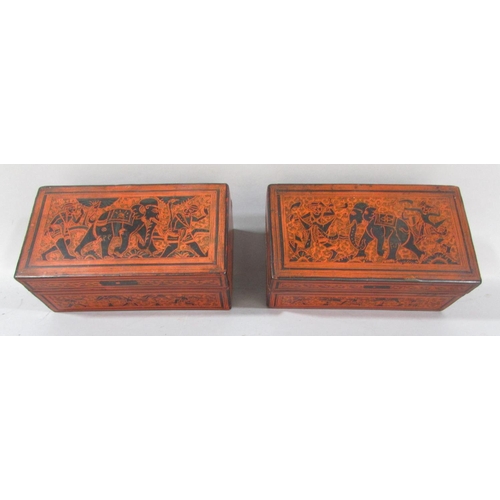 500 - A collection of five Burmese red lacquered ware, two circular boxes, a single rectangular box and tw... 