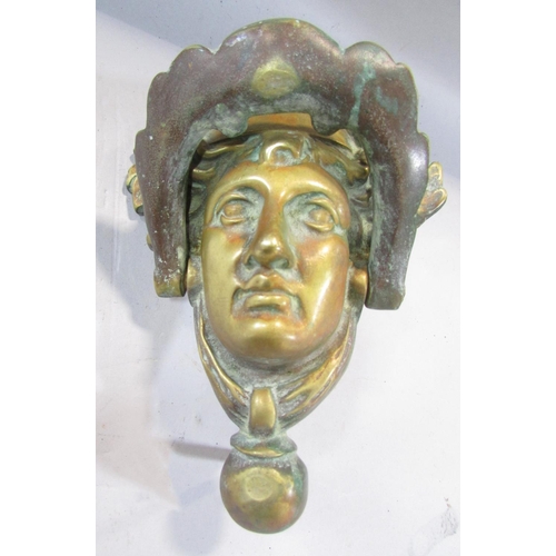 501 - A brass French Empire style Baccanalian female mask door knocker, with screw fastenings, 18cm.