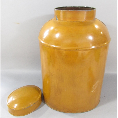 504 - A large mustard coloured tin tea canister / caddy 45cm high together with, a tin tortoise shell tea ... 