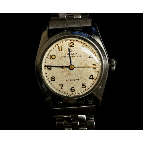 431 - Rolex. An Oyster Precision Speedking wristwatch, with black Arabic numerals, on associated stainless... 