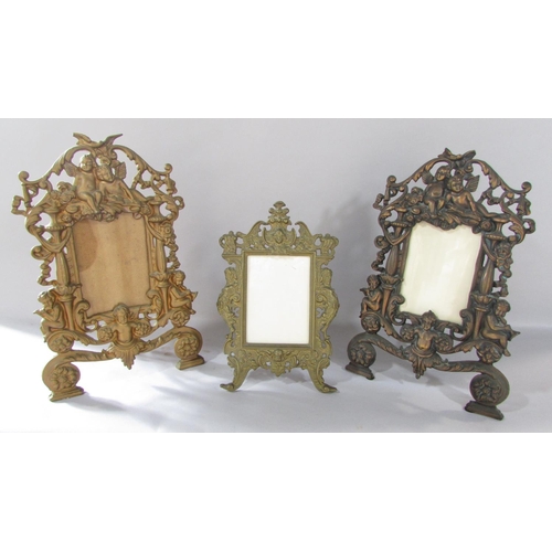 516 - A pair of Rococo frames with cherubs and scrolling to the  gold finished frames 36cm x 23cm together... 