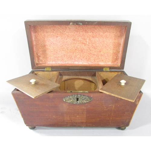 518 - A 19th century mahogany sarcophagus tea caddy, in need of restoration.