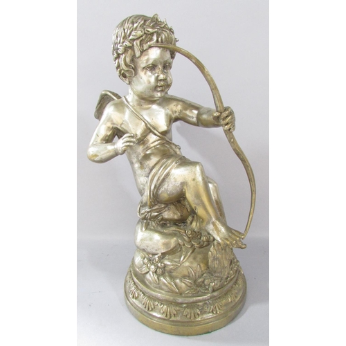 522 - A classical statuette of Cupid letting loose an arrow, his gaze fixed on his victim, in a silver met... 