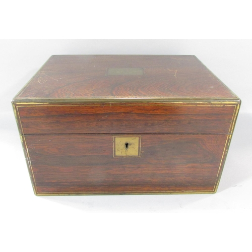 525 - A 19th century rosewood travelling stationery/ vanity box, with some original glass and silver plate... 