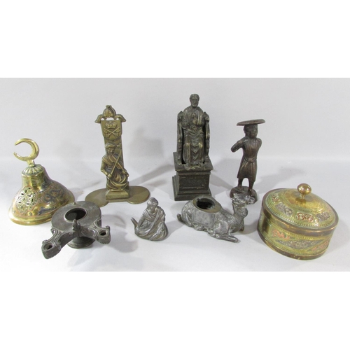 526 - A miscellaneous collection of small bronze and spelter statues, including St Peter, a camel, a violi... 