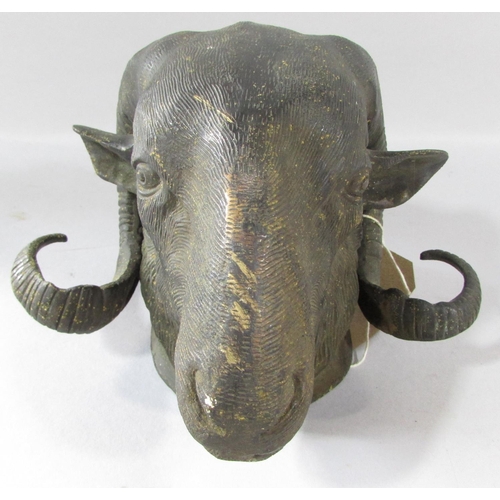 527 - A 19th century cast bronze study of a ram’s head with curly horns, 19cm.