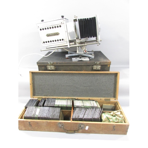 529 - A 20th century Optiscope Magic lantern and a box of slides including Wales, England, Italy landmarks... 