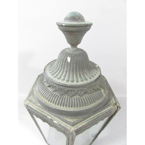 532 - A pair of Victorian hexagonal carriage lamps, in a weathered finish, 33cm high. (One glass panel cra... 