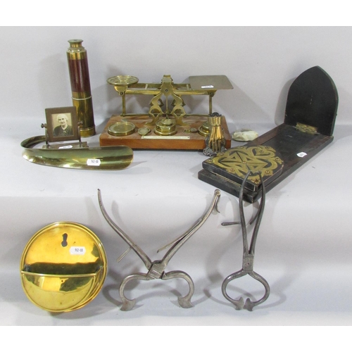 534 - Two pairs of Georgian steel sugar nips, a pair of Victorian postal scales with a selection of weight... 