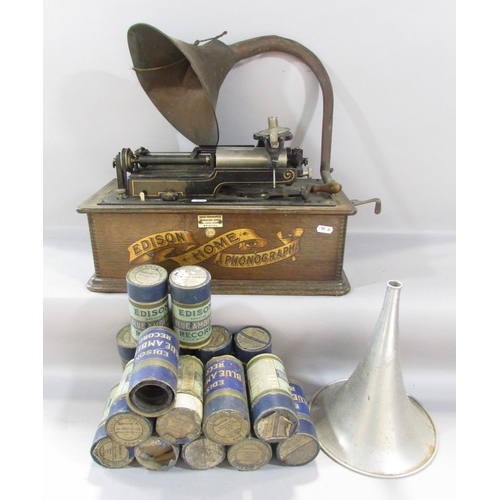 535 - An Edison Home Phonograph (A/F) with a selection of sixteen wax cylinder recordings.