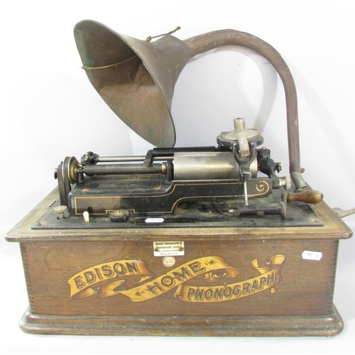 535 - An Edison Home Phonograph (A/F) with a selection of sixteen wax cylinder recordings.