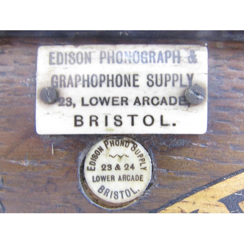 535 - An Edison Home Phonograph (A/F) with a selection of sixteen wax cylinder recordings.