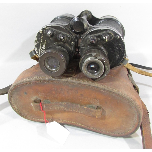 537 - A pair of vintage binoculars and leather case, together with a leather shoulder bag and a cartridge ... 