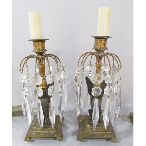 544 - A small pair French Empire Sphinx type table lustres, with shades, 25cm high.