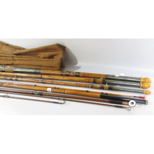 548 - A vintage four-piece Arthur Smith & Co split bamboo fishing rod, together with another three-piece r... 