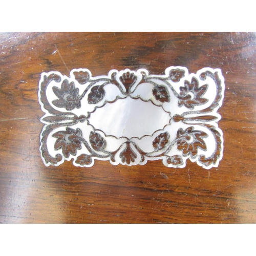 552 - A Victorian rosewood and mother of pearl tray, 26cm x 21cm.