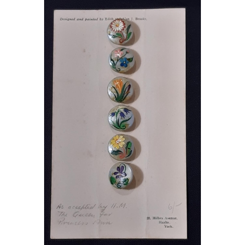 754 - A collection of mixed buttons all displayed on card or in frames, including a set of 9 Mother of Pea... 