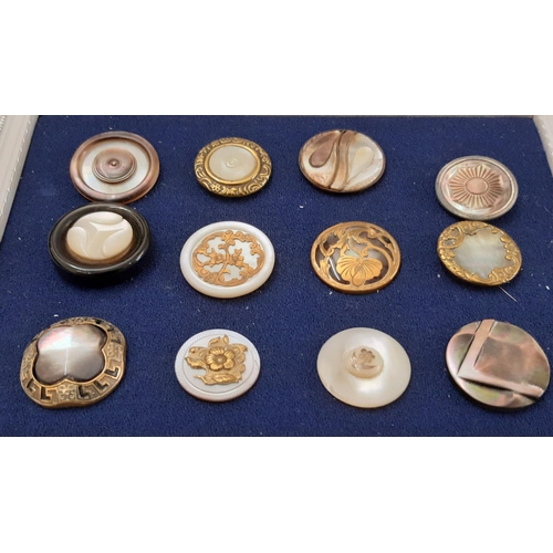 757 - A collection of Mother of Pearl  buttons including some finely worked examples with metal frames, ot... 