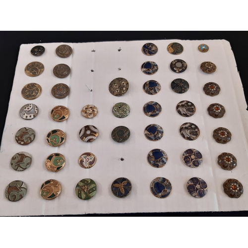 762 - A collection of 70 round decorative buttons, all metal based  including enamel work, pierced buttons... 