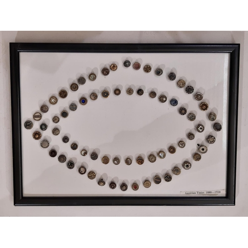 766 - A collection of 70 small metal Austrian Tinie buttons, late 19th to early 20th century, all 1 cm in ... 